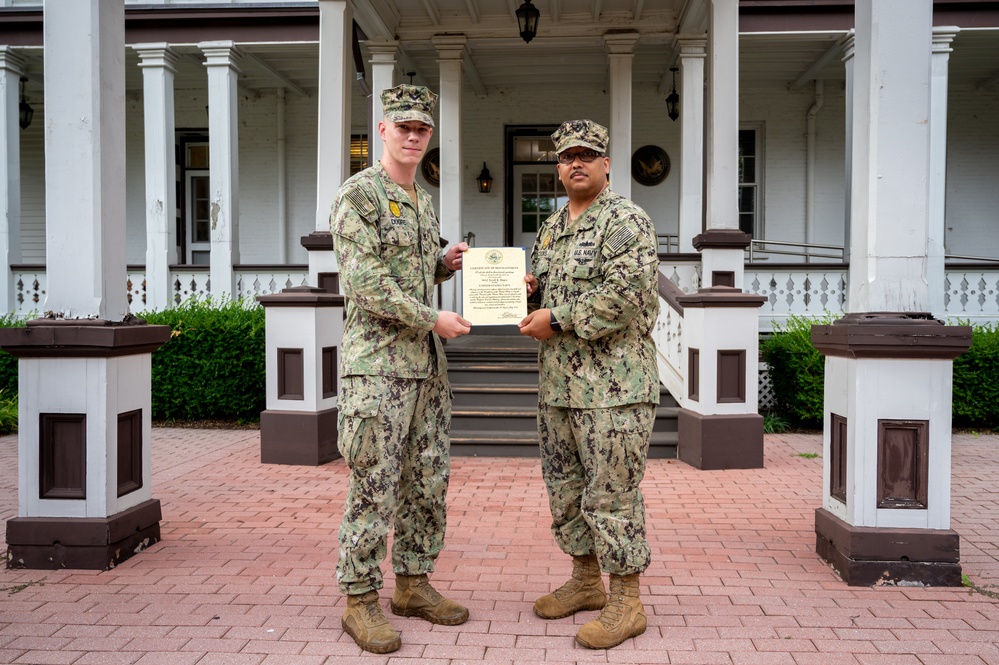 MA2 Tyrell Dugre reenlistment ceremony