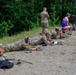 U.S. Reserve service members check their targets after firing their M4 rifles