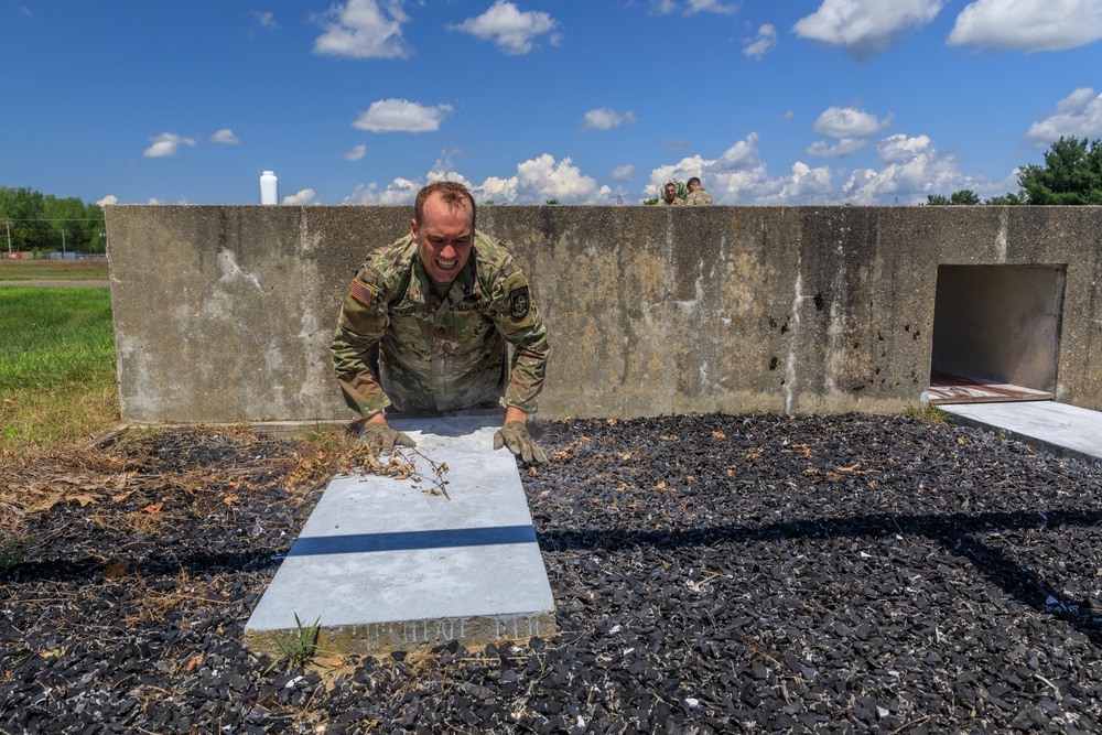 Sgt. Morgan Figgs emerges from an obstacle