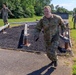 Sgt. 1st Class Shane Price completes an obstacle