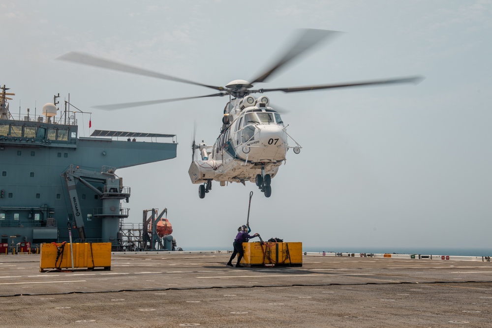 USS Lewis B. Puller Conducts Replenishment At Sea With USNS Cesar Chavez