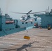 USS Lewis B. Puller Conducts Replenishment At Sea With USNS Cesar Chavez