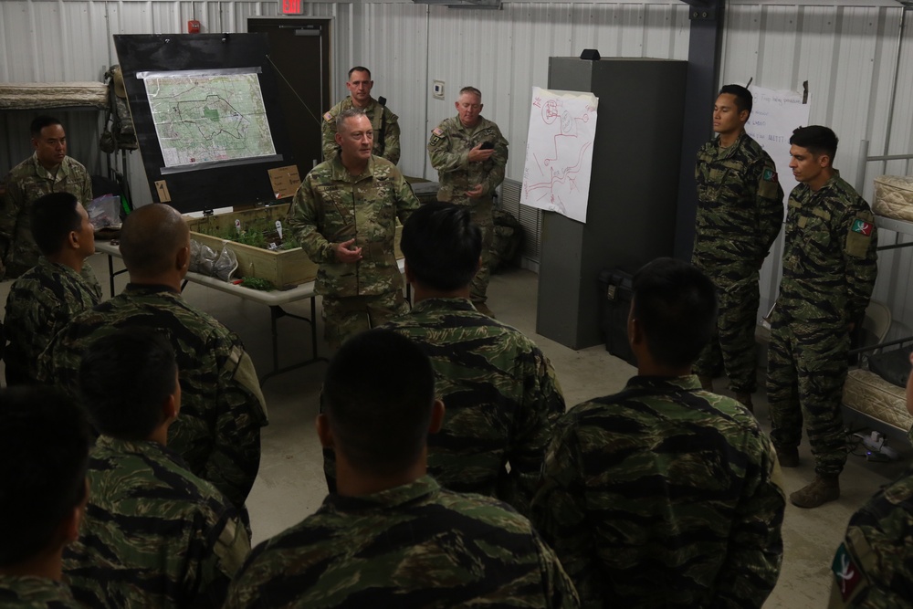 Brigadier General Stephen Logan, Deputy Adjutant General Hawaii National Guard visits his troops at Fort Polk, La.