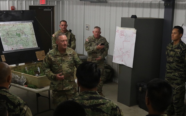 Brigadier General Stephen Logan, Deputy Adjutant General Hawaii National Guard visits his troops at Fort Polk, La.