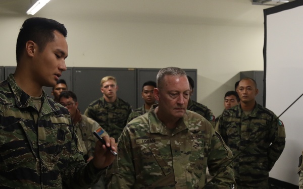Brigadier General Stephen Logan, Deputy Adjutant General Hawaii National Guard visits his troops at Fort Polk, La.