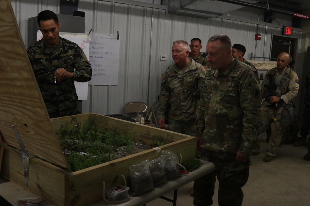 Brigadier General Stephen Logan, Deputy Adjutant General Hawaii National Guard visits his troops at Fort Polk, La.