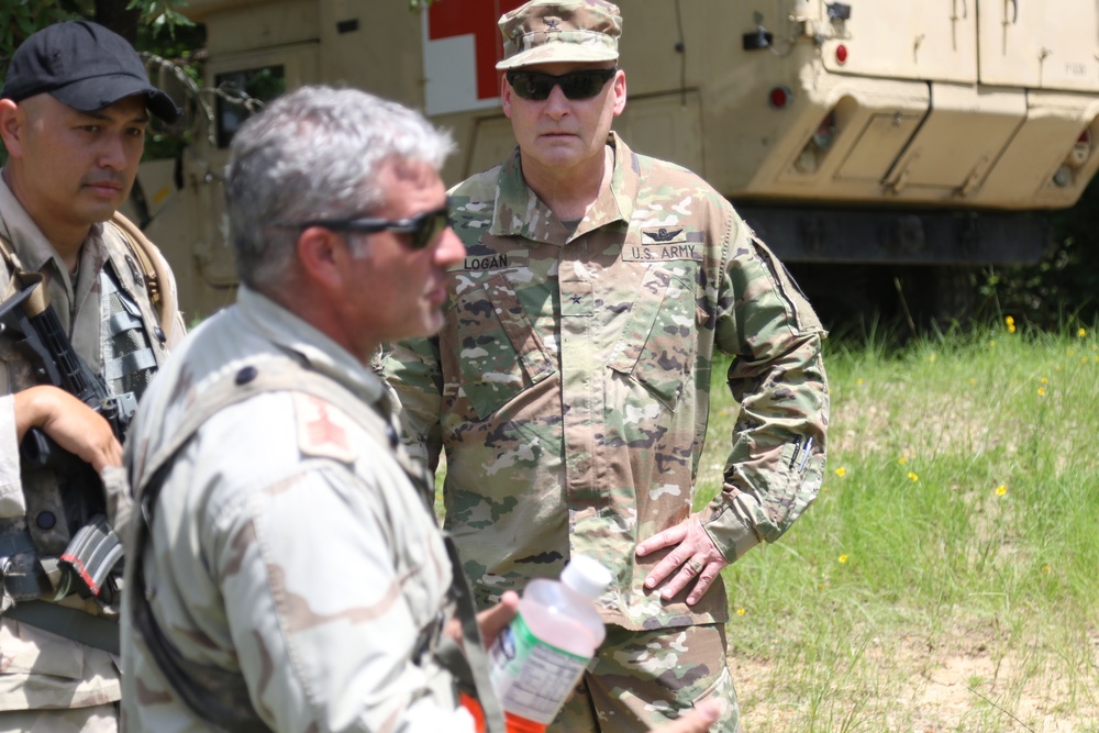 Brigadier General Stephen Logan, Deputy Adjutant General Hawaii National Guard visits his troops at Fort Polk, La.