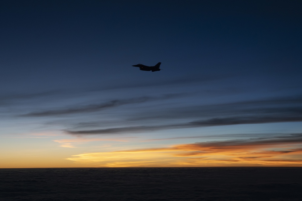 U.S. Air Force F-16 Fighting Falcon Aircraft Flies Through The Sky