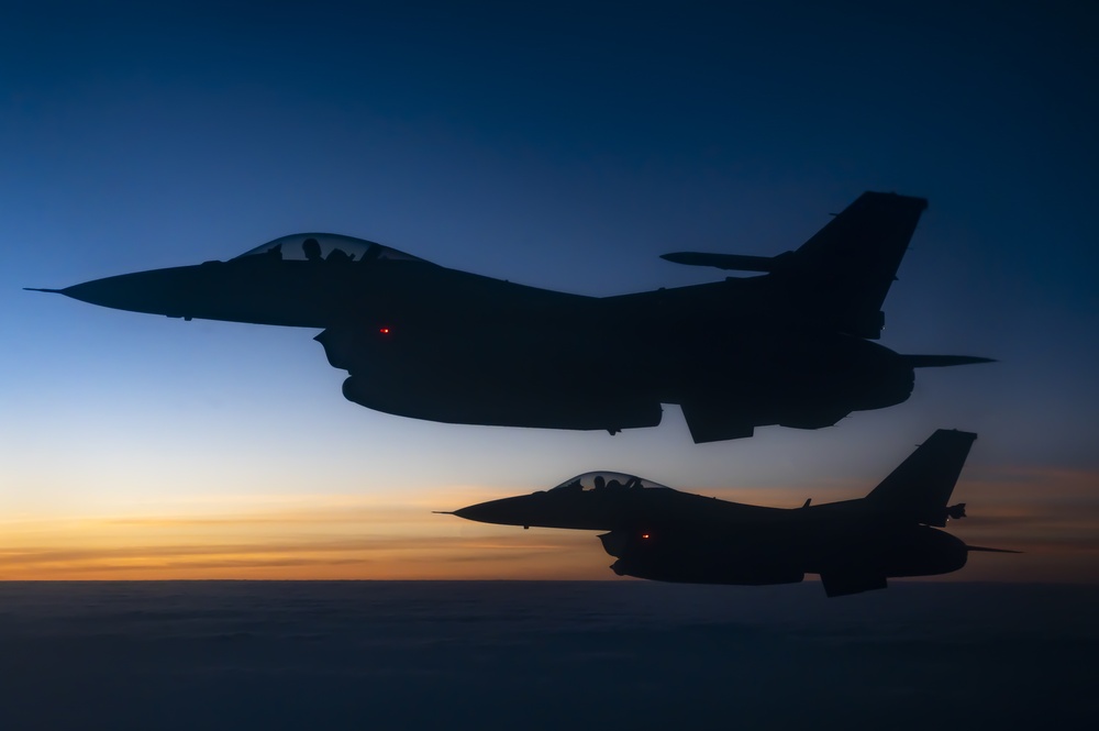 Two U.S. Air Force F-16 Fighting Flacon Aircraft fly Through The Sky