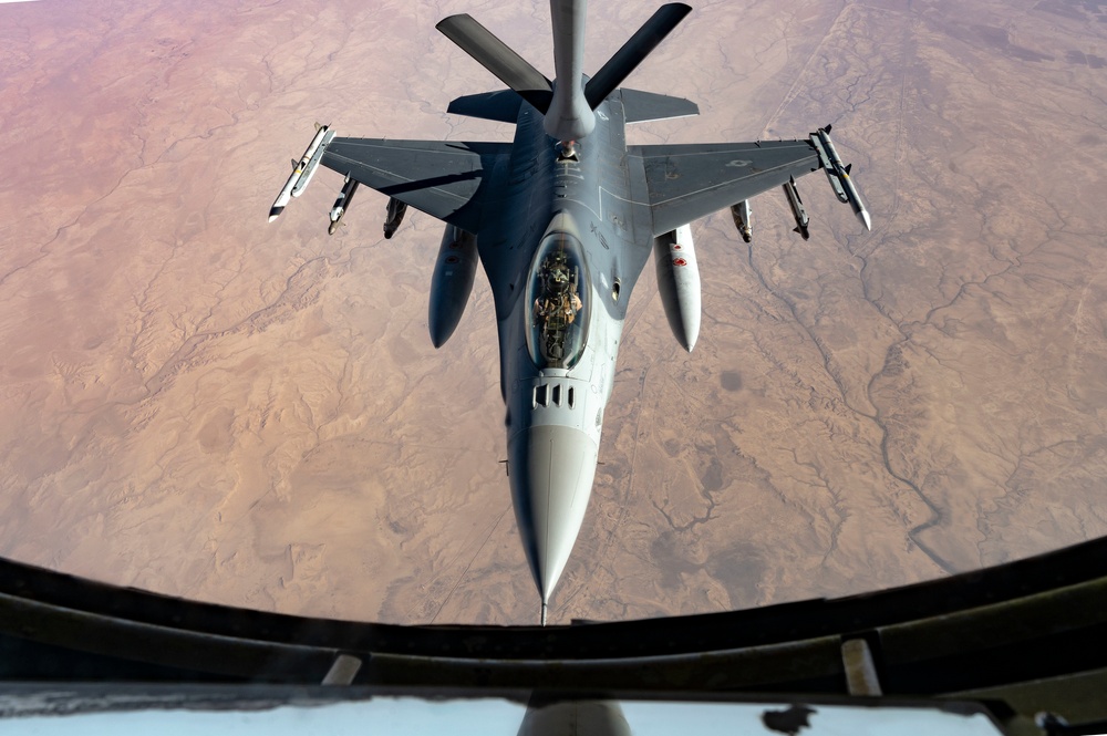 U.S. KC-135 Stratotanker Aircraft Refuels A U.S. Air Force F-16 Fighting Falcon