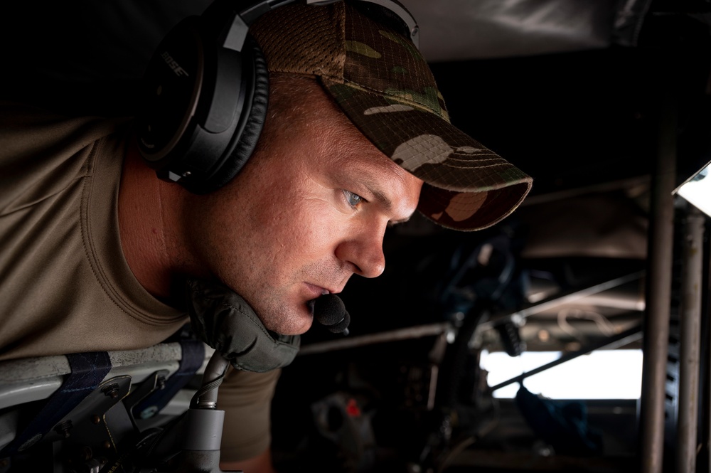 U.S. Air Force Inflight Refueling Specialist Prepares To Refuel A Aircraft