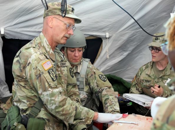 Army medical units practice life saving techniques at Regional Medic 86-21-01