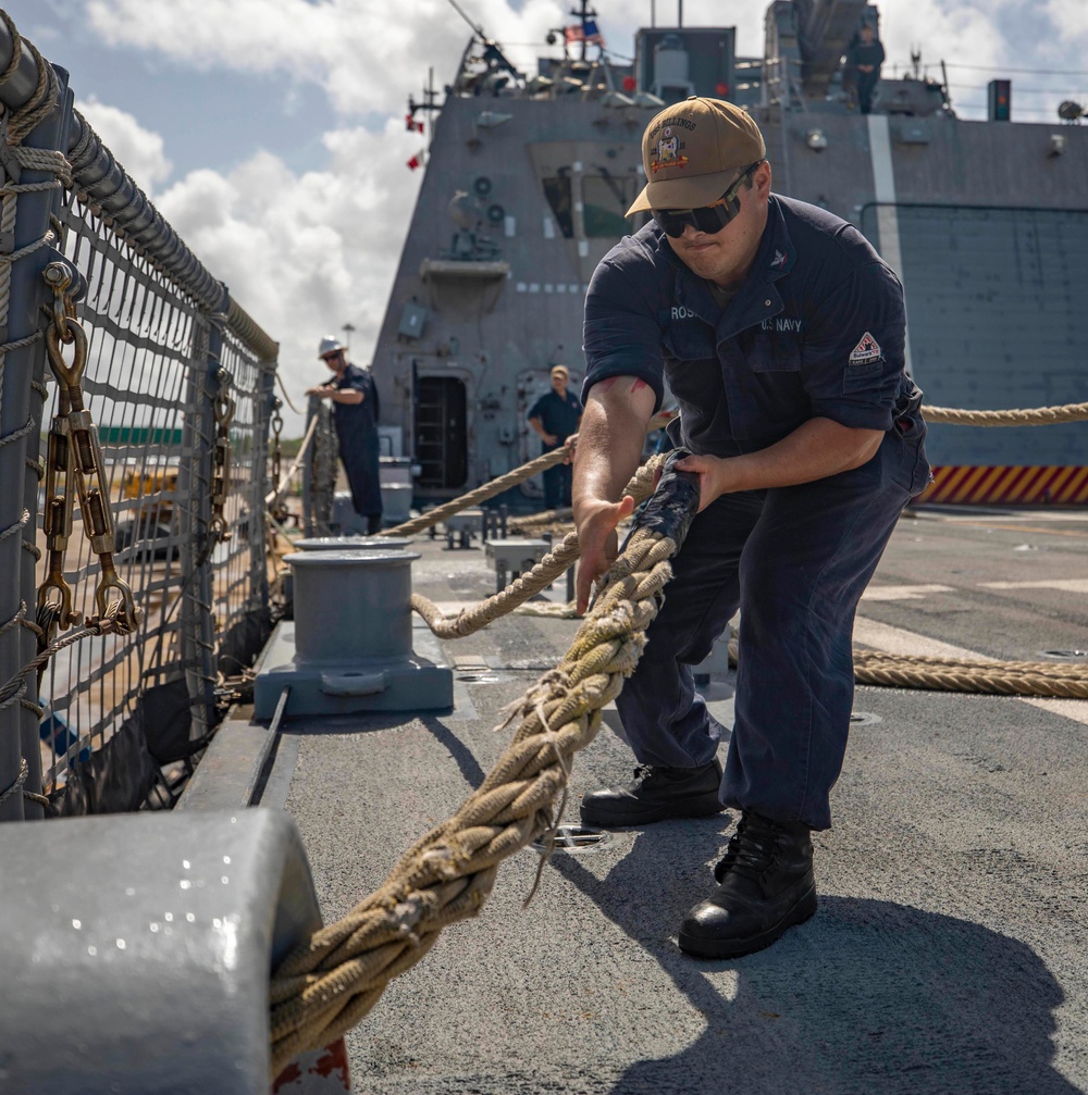 USS Billings Sailor Heaves Around a Line During Sea and Anchor Detail