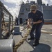 USS Billings Sailor Heaves Around a Line During Sea and Anchor Detail