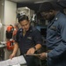 USS Jackson (LCS 6) Sailors perform spot check