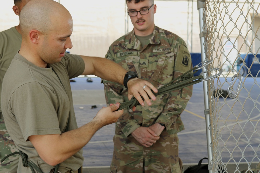 Task Force Iron Gray Soldiers sustain Mountain Warfare skills