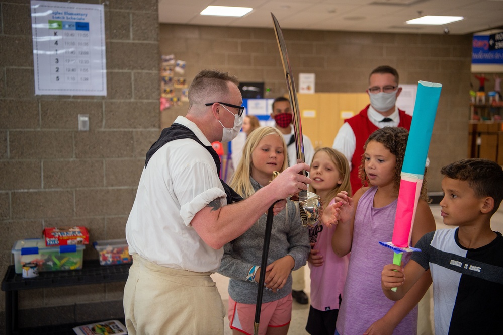 Boatswain’s Mate 2nd Class Kevin Crowder promotes USS Constitution at the Boys and Girls Club in Fargo, North Dakota