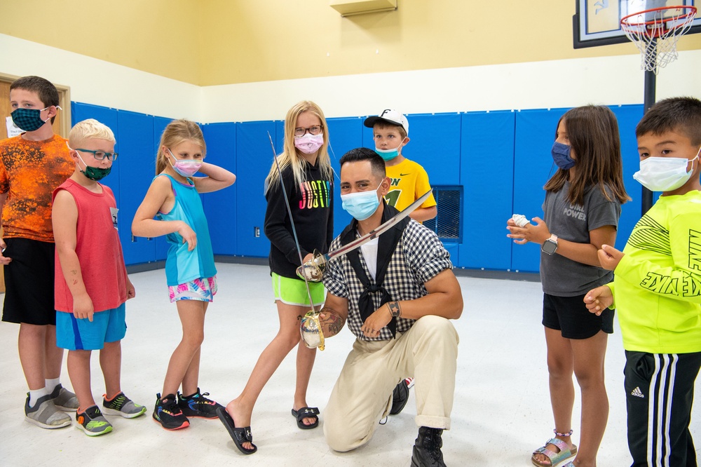 Seaman Alfonso Ortiz-Lopez promotes USS Constitution at the Boys and Girls Club in Fargo, North Dakota