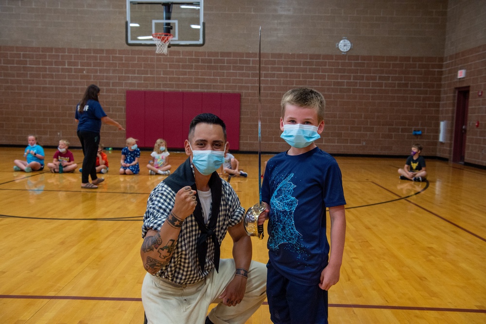 Seaman Alfonso Ortiz-Lopez promotes USS Constitution at the Boys and Girls Club in Fargo, North Dakota