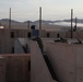 Members of the 45th Infantry Brigade Combat Team provide rooftop security
