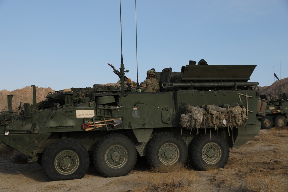 Soldiers in the California National Guard provide security from their M1126 Stryker