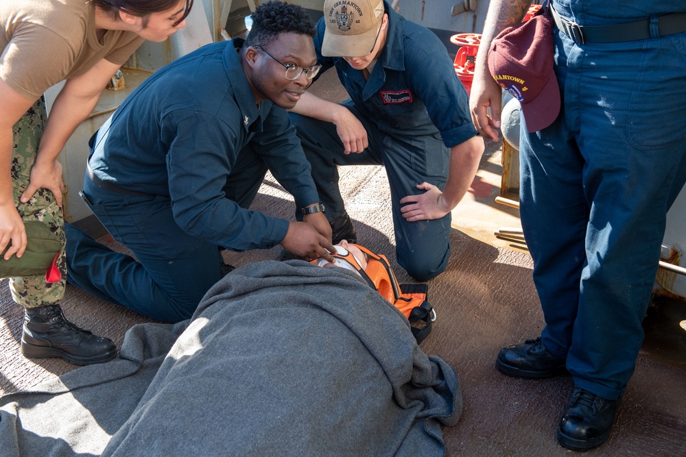 Sailors participate in casualty drill.