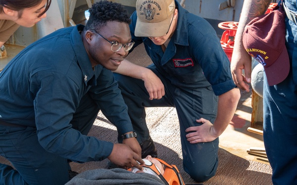 Sailors participate in casualty drill.
