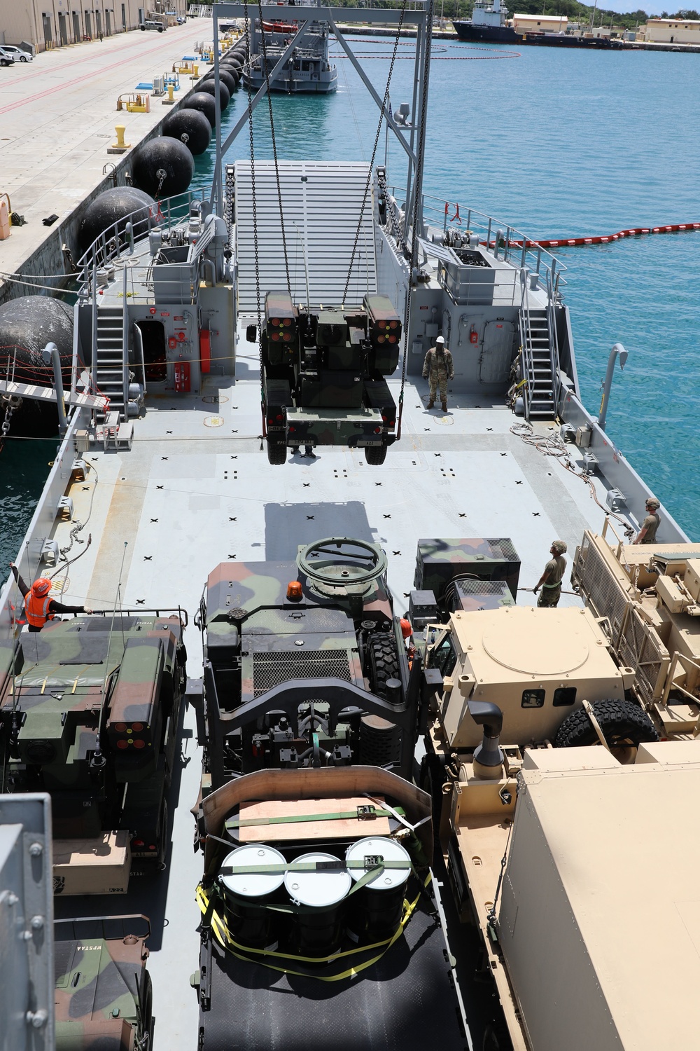 Soldiers Load Avenger Air Defense System onto Army Watercraft System for Forager 21