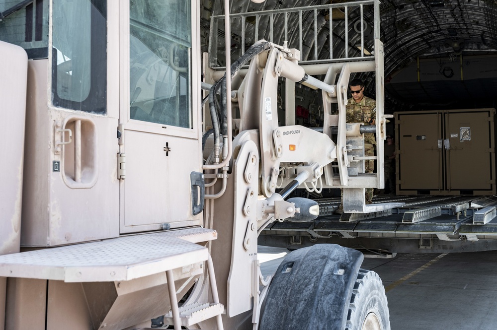 U.S. Air Force Airmen Prepare to Unload Cargo