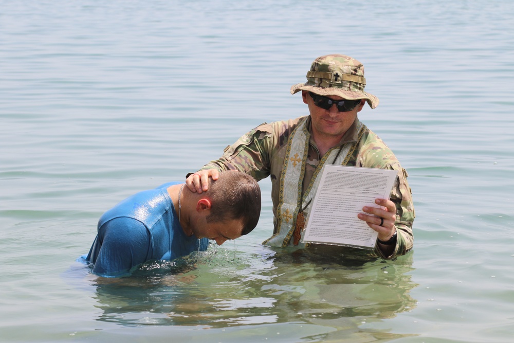 Task Force Iron Gray Chaplain baptizes Soldier in Gulf of Aden