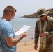 Task Force Iron Gray Chaplain baptizes Soldier in Gulf of Aden
