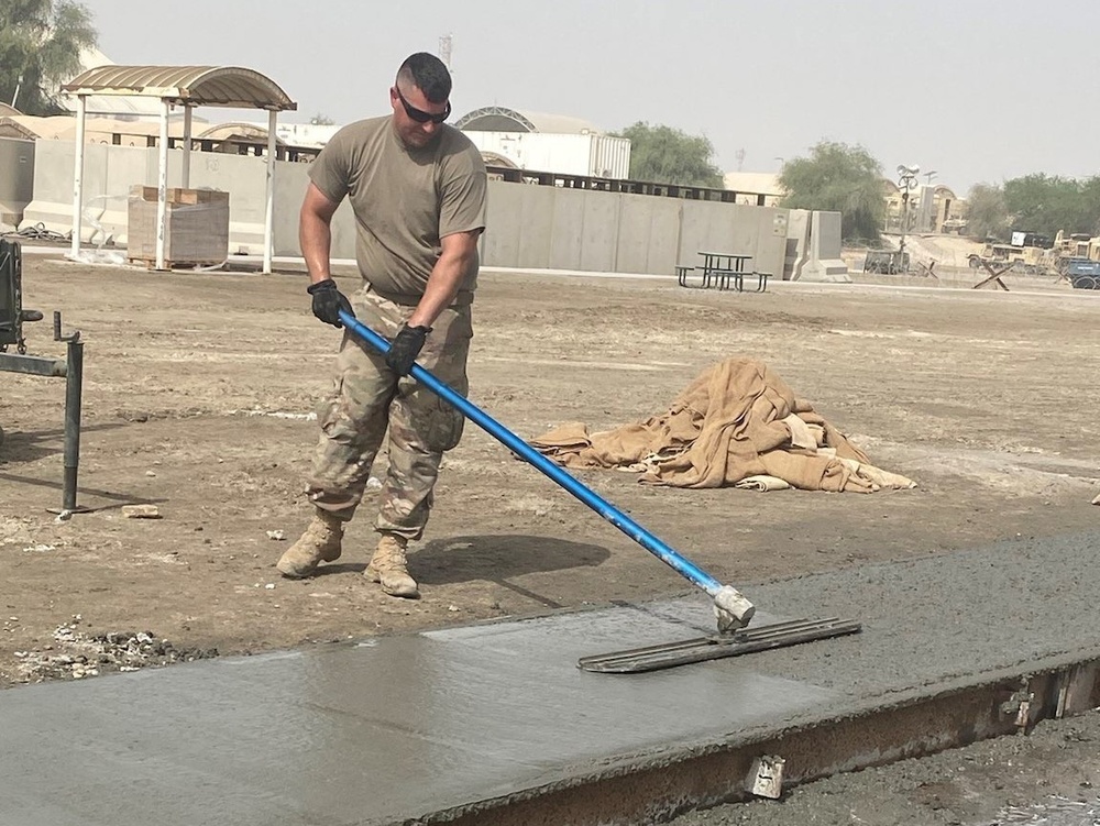 111th Theater Engineer Brigade Soldiers Construct Sidewalks on Al Dhafra Air Base