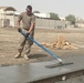 111th Theater Engineer Brigade Soldiers Construct Sidewalks on Al Dhafra Air Base