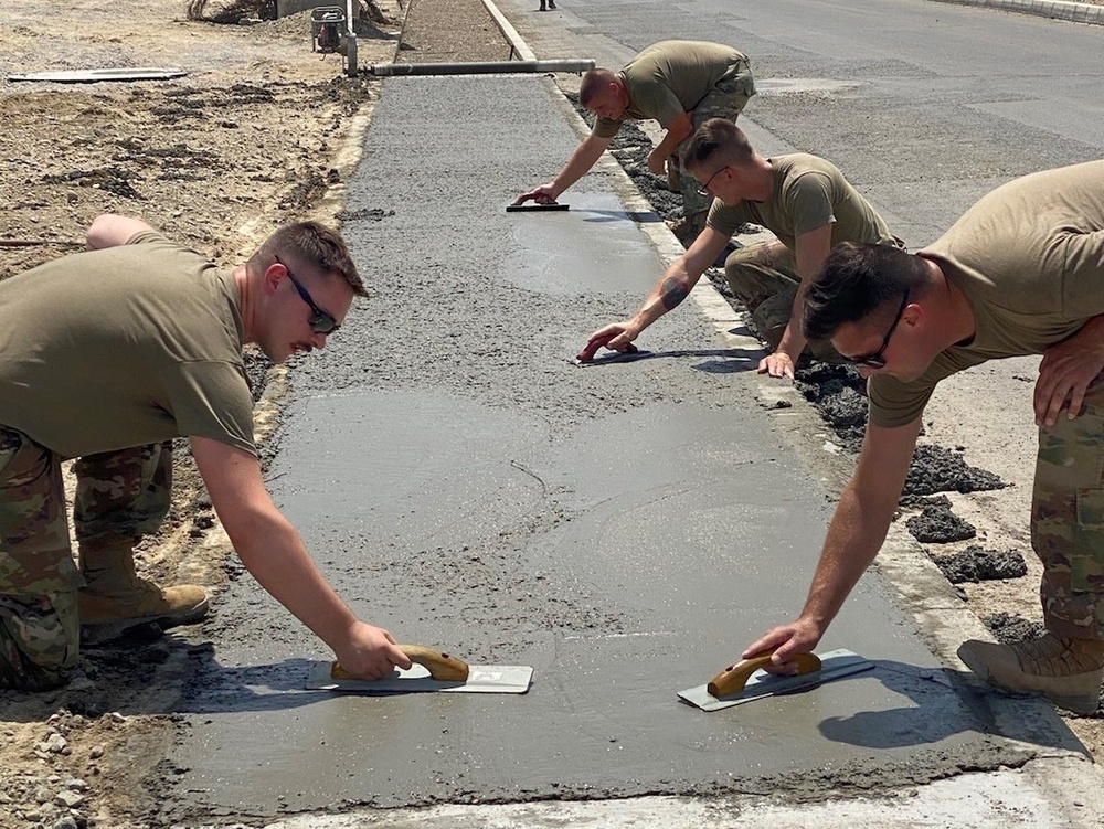 111th Theater Engineer Brigade Soldiers Construct Sidewalks on Al Dhafra Air Base