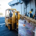 USS Carl Vinson (CVN 70) Sailor Operates Forklift