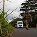 U.S. Army Master Sgt. Andrew Devito ruck marches during U.S Army Medical Command Best Leader Competition