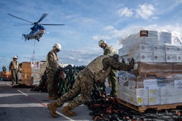 USS America (LHA 6) Conducts A Replinishment-At-Sea