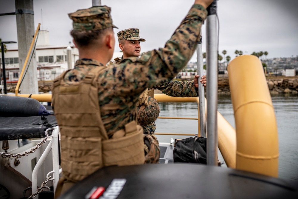 Reserve Marines train alongside Coast Guard to provide communication assets as part of the Tri-Service Maritime Strategy