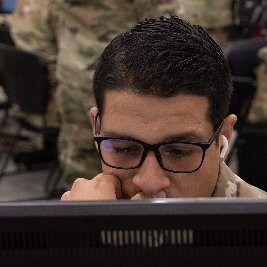 Airman 1st Class Aaron Durney assigned to the 152nd Communications Flight scans his screen for threats during Cyber Dawn 2021