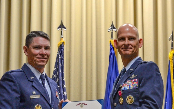 688th Cyberspace Wing commander awards Legion of Merit to Col. James Trachier