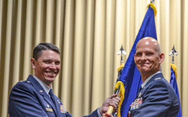 Outgoing 38th Cyberspace Engineering Installation Group commander relinquishes the flag