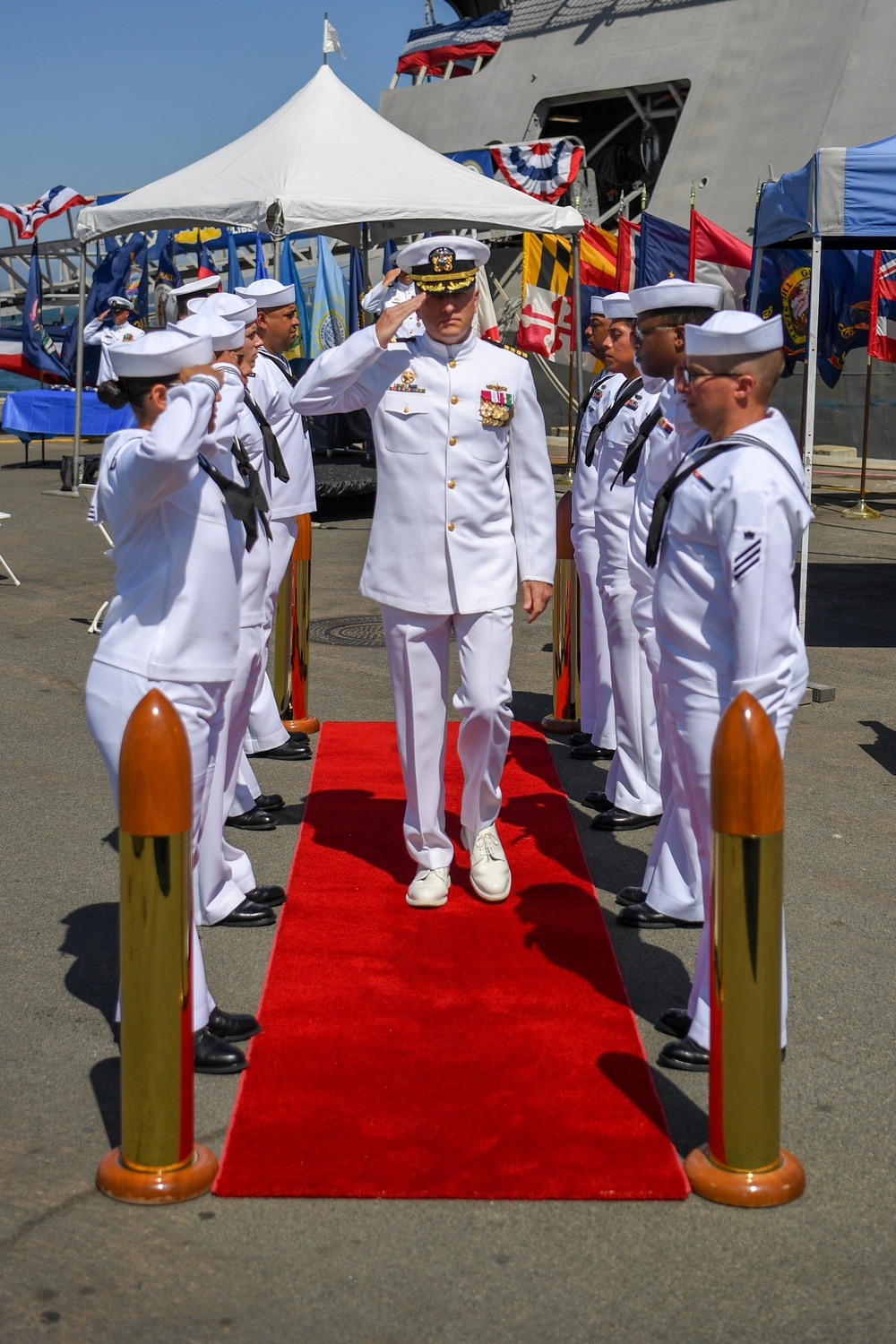 Capt. John Fay, Commodore, LCSRON ONE, departs from USS Independence (LCS 2) decommisioning