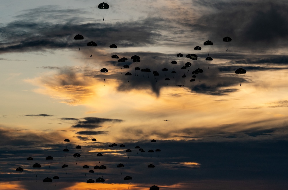 Airborne personnel descend on Guam