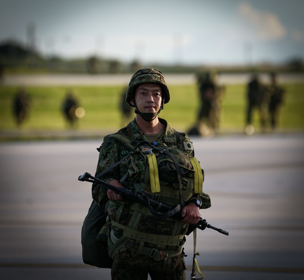 Airborne personnel descend on Guam during Exercise Forager 21