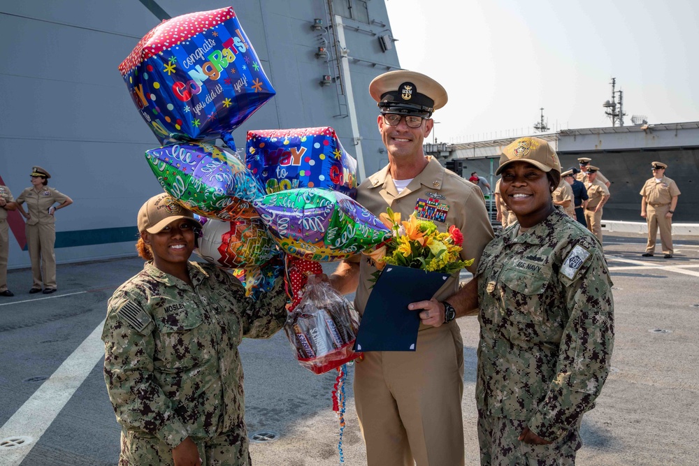USS Arlington pins new master chief and senior chief