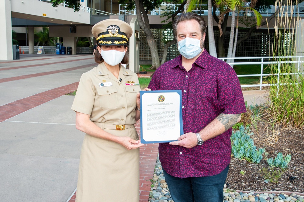 Staff Member Receives Award Onboard NMRTC San Diego July 30