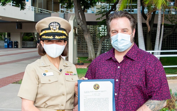Staff Member Receives Award Onboard NMRTC San Diego July 30