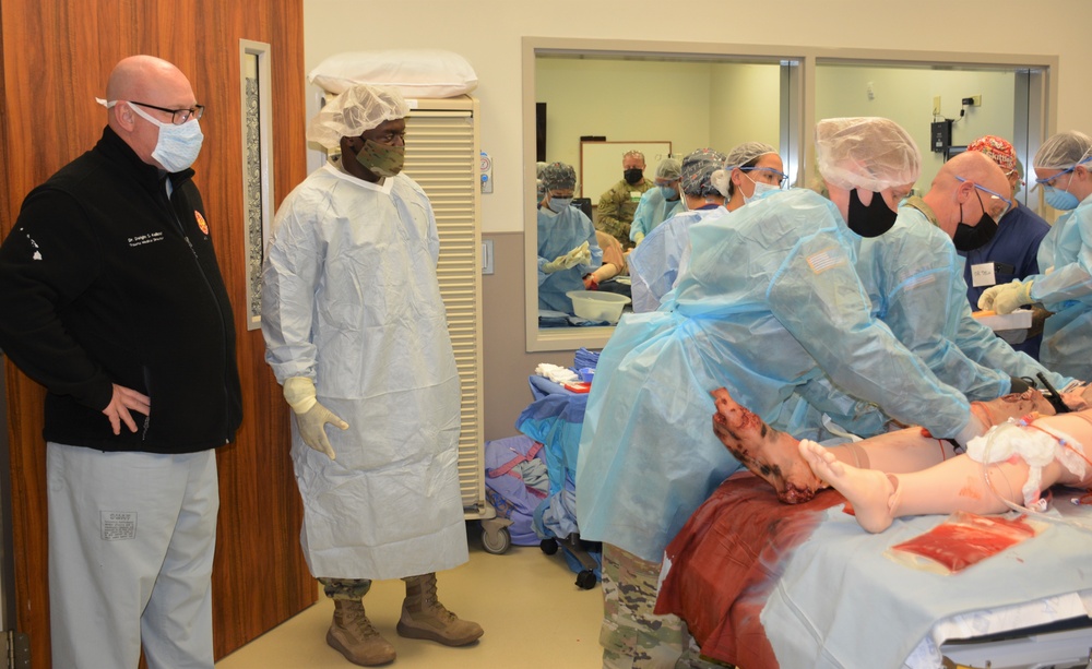 U.S. Army Surgeon General participates in a medical trauma simulation at Tripler Army Medical Center