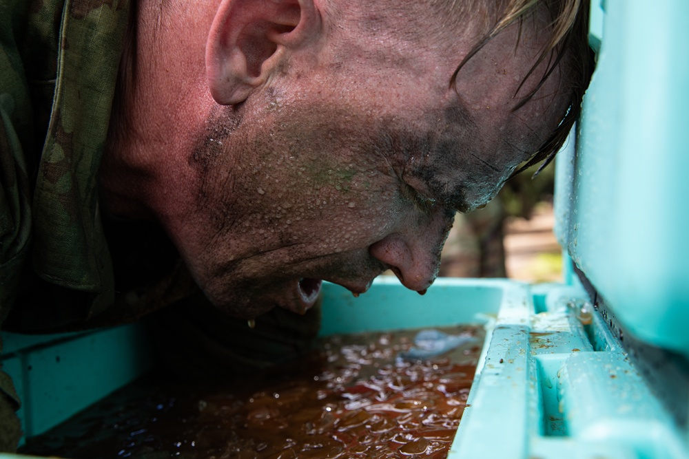 U.S. Army Combat Medic 1st Sgt. James Buchanan Completes the Obstacle Course During Army Medicine 2021 Army Medicine Best Leader Competition