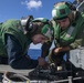 Sailors conduct maintenance on an MH-60R Seahawk assigned to the “Warlords” of Helicopter Maritime Strike Squadron (HSM-51)